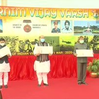 Delhi: Defence Minister Rajnath Singh issues a commemorative stamp on the occasion of 50th #VijayDiwas at the National War Memorial.