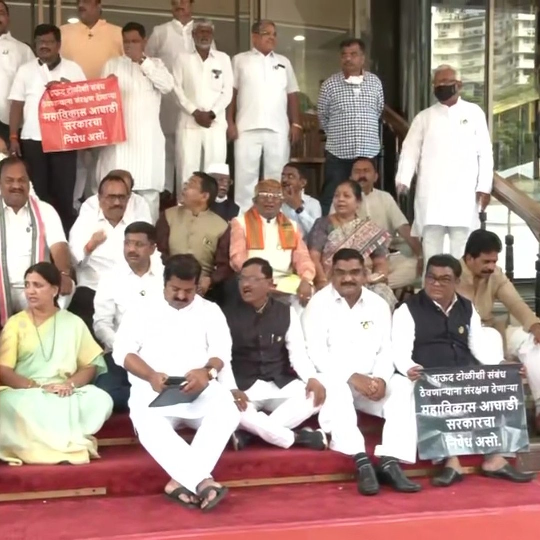 Mumbai | BJP MLA's continue to protest outside Maharashtra Assembly demanding the resignation of state minister Nawab Malik, in connection with Dawood Ibrahim money laundering case.