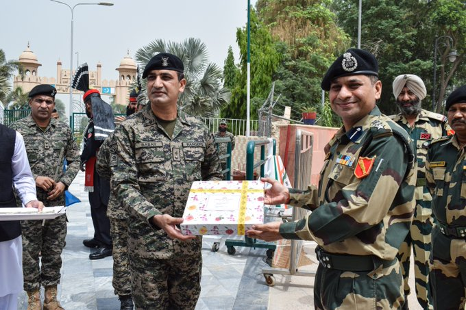 Border Security Force and Pakistan Rangers exchange sweets on the occasion of #EidUlFitr at Joint Check Post at Hussainiwala in Punjab . Senior officials of both sides remained present during the sweet exchange ceremony.