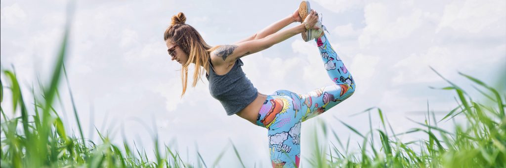 girl stretching outside