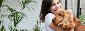 woman petting dog