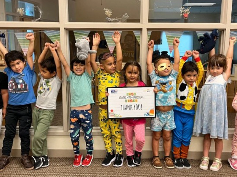 group of children smiling at the camera