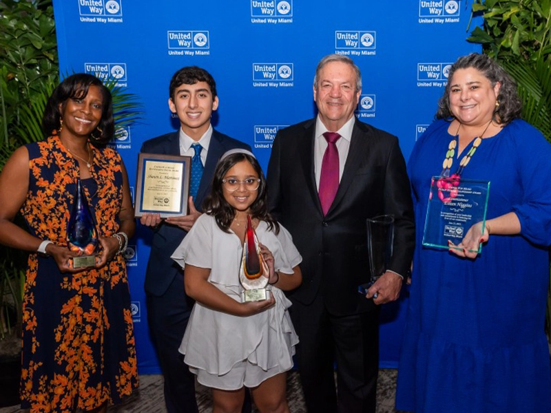 group of people during event, receiving recognition