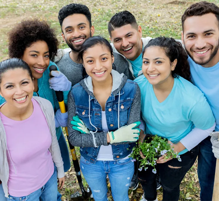 group photo of people planting