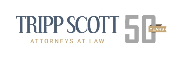 Logo that reads Tripp Scott 50
