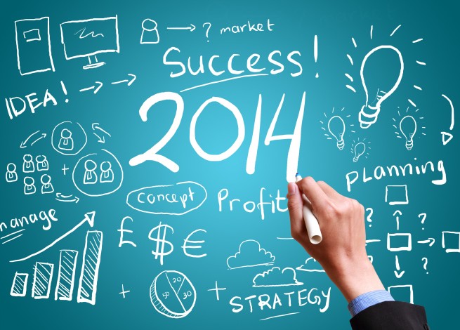 Pizarra verde con la frase Success! 2014