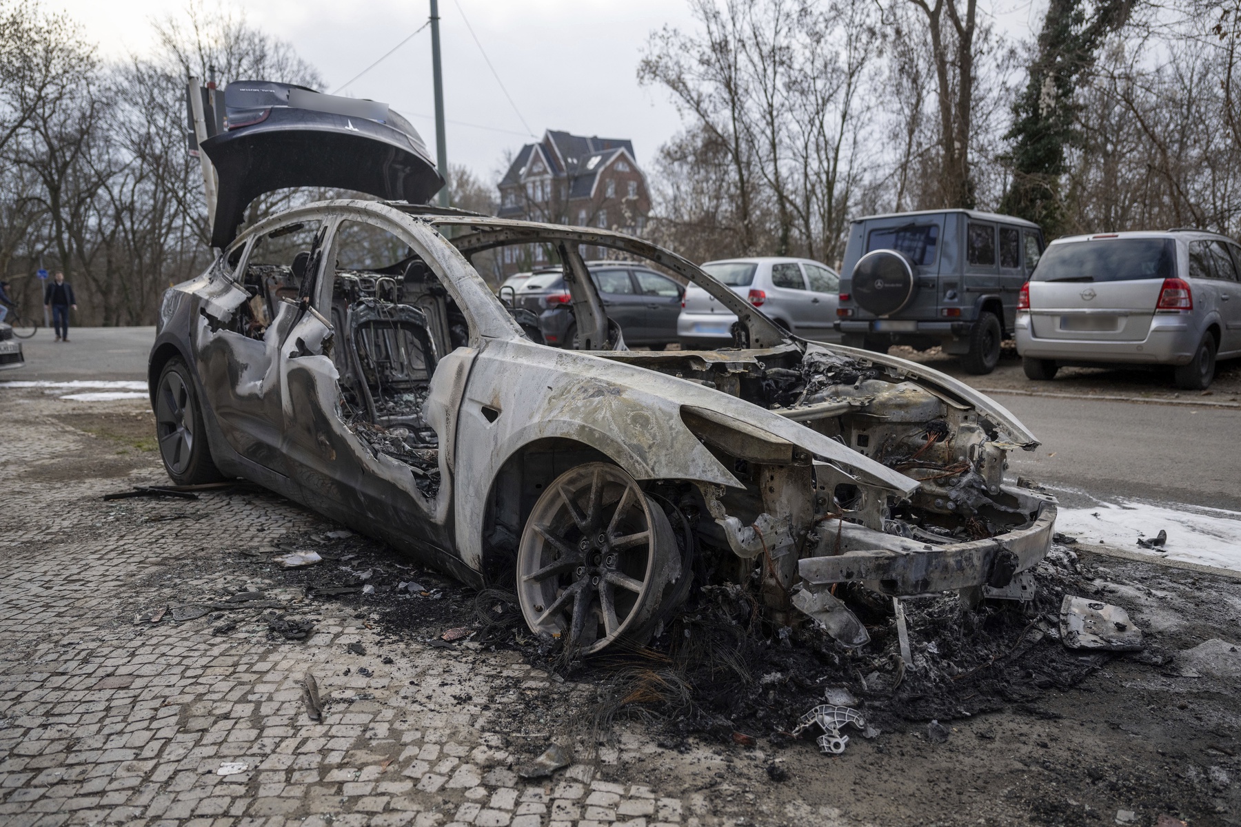 Particle: Tesla Faces Backlash as Protests and Vandalism Escalate Over ...