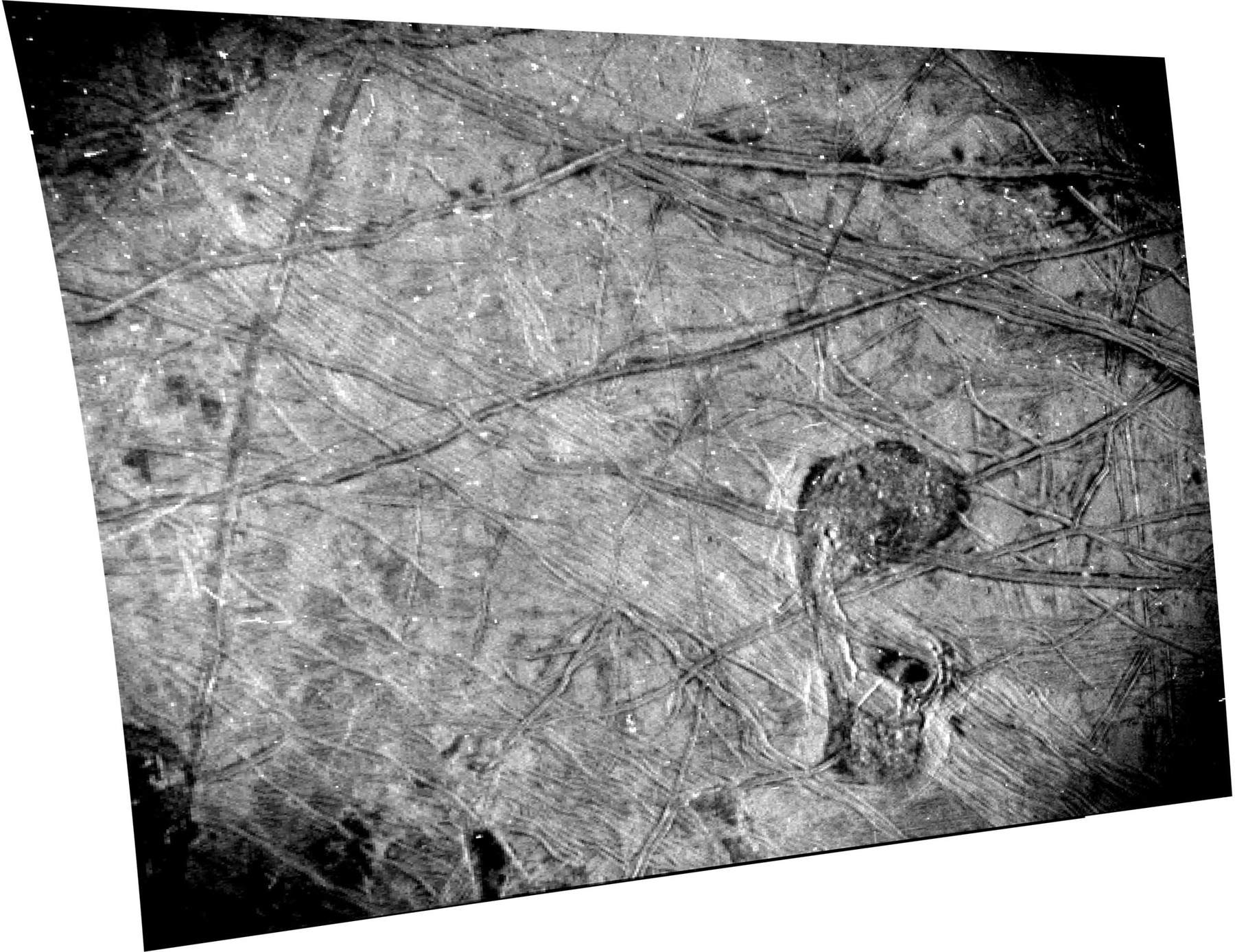 This black-and-white image of Europa’s surface was taken by the Stellar Reference Unit (SRU) aboard NASA’s Juno spacecraft during the Sept. 29, 2022, flyby. The chaos feature nicknamed “the Platypus” is seen in the lower right corner. Credit: NASA/JPL-Caltech/SwRI