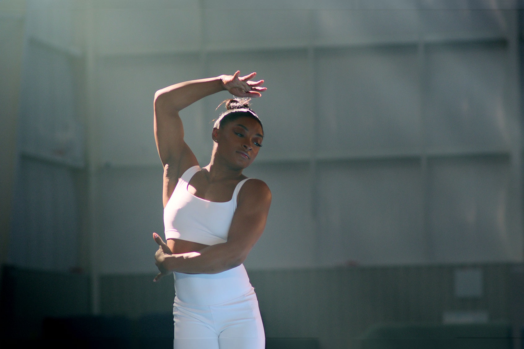 Particle News Netflix's 'Simone Biles Rising' Explores Gymnast's