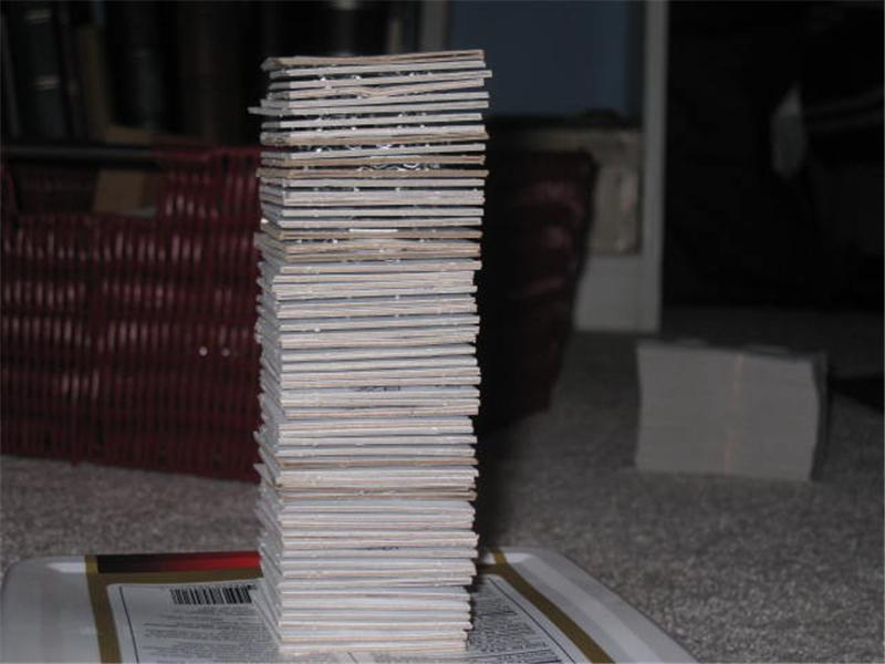 Most Cardboard Coin Holders With Coins Stacked