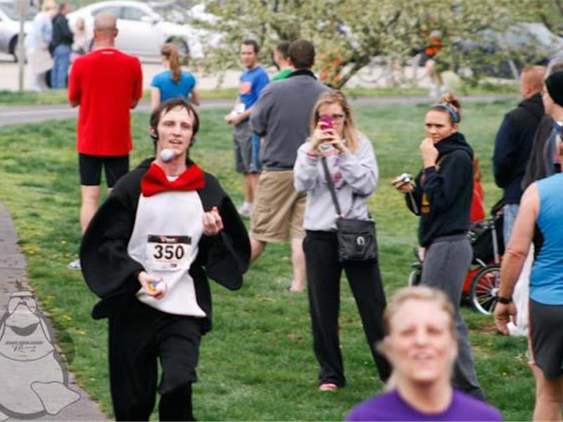 Fastest 5K Run While Juggling Three Balls And Dressed Like A Penguin
