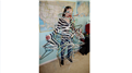 Most Hangers Hung On A Body While Holding Four Twizzlers In Mouth