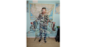 Most Hangers Hung On A Body While Holding Four Twizzlers In Mouth