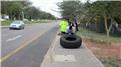 Fastest Time For Two People To Flip A 100-Kilogram Tire Four Kilometers
