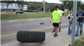 Fastest Time For Two People To Flip A 100-Kilogram Tire Four Kilometers