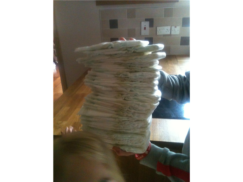 Most Nappies Balanced In One Hand At Once