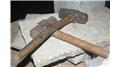 Most 50-Kilogram Rock Slabs Broken On Body Using A Sledge Hammer