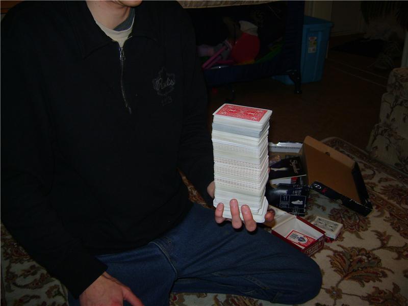 Most Playing Cards Held In Hand At Once
