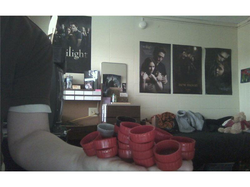 Most Coca-Cola Bottle Caps Held In Hand At Once