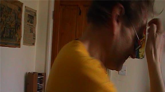 Most Dominoes Balanced on Elbow and Caught