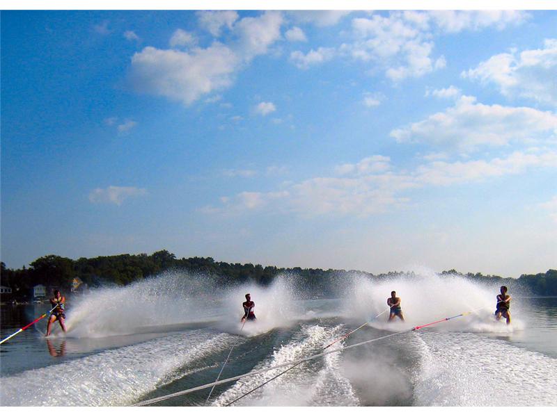 Largest Group Of People To Waterski Barefoot Behind The Same Boat