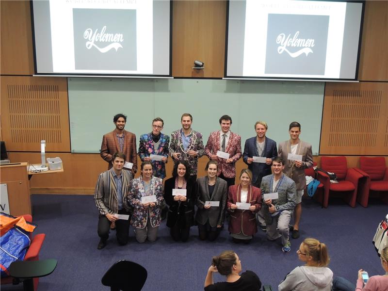 Most People Wearing Different Multicolored Jackets While Supporting 