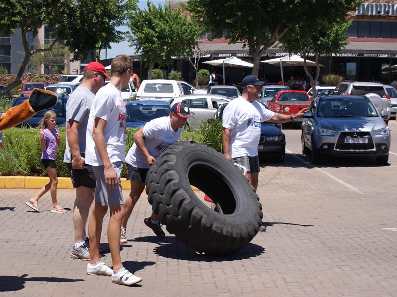 Fastest Time For Two People To Flip A 100-Kilogram Tire 2.5 Kilometers