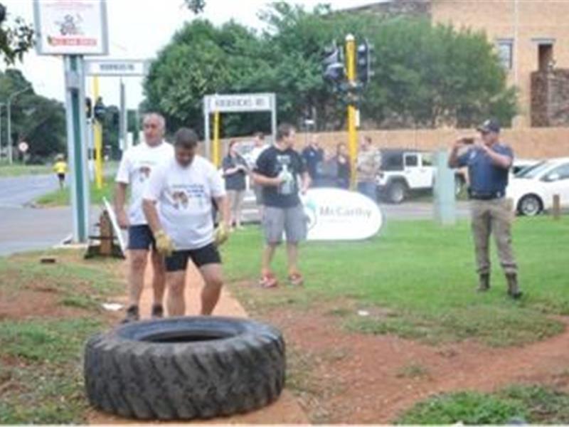 Fastest Time For Two People To Flip A 100-Kilogram Tire 10 Kilometers