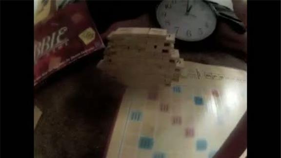 Widest Top of a Stack of Scrabble Tiles on One Tile