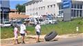 Fastest Time For Two People To Flip A 100-Kilogram Tire 2.5 Kilometers