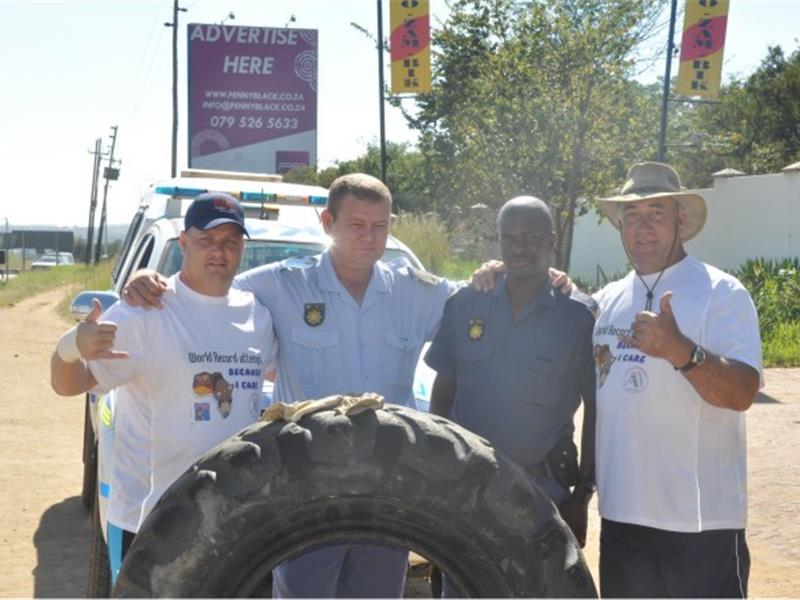 Fastest Time For Two People To Flip A 100-Kilogram Tire 2.5 Kilometers