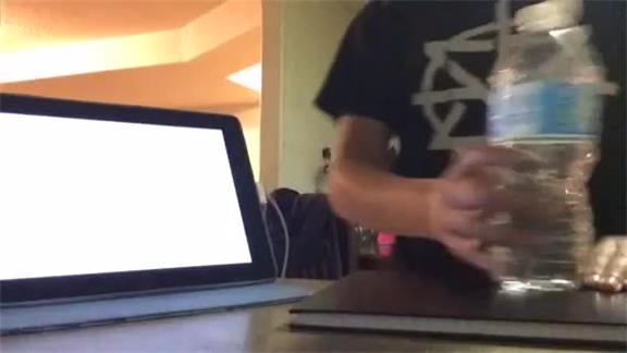 Most Plastic Bottle Flips Onto A Book In One Minute