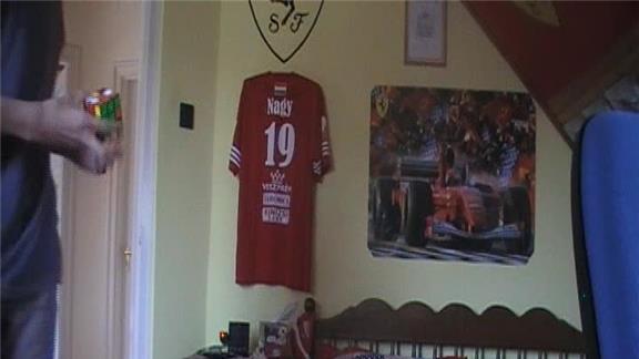 Most Consecutive Tennis Ball Bounces On Alternate Sides Of A  Rubik\'s Cube