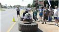 Fastest Time To Flip A 209-Kilogram Tire One Kilometer