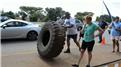 Fastest Time To Flip A 209-Kilogram Tire One Kilometer