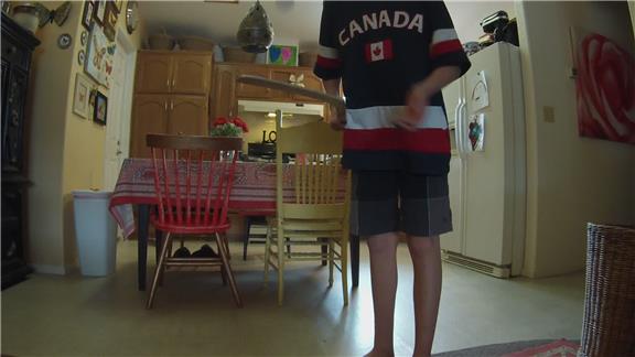 Longest Time Bouncing A Hockey Ball On A Hockey Stick While Kneeling