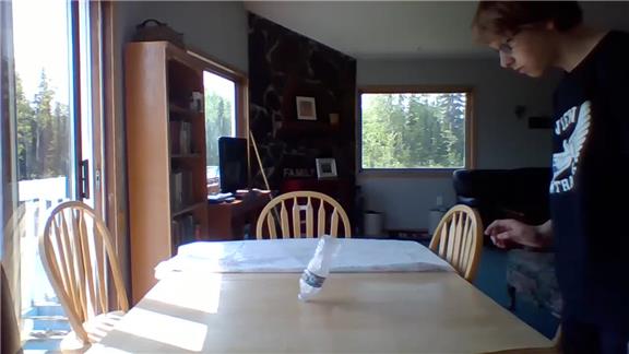 Most Water Bottle Flips Landed on the Cap in One Minute