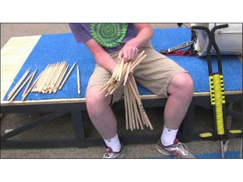 Most Drumsticks Held In One Hand