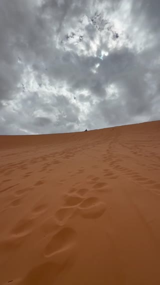 Longest Airtime While Performing a Board Grab on a Sand Dune