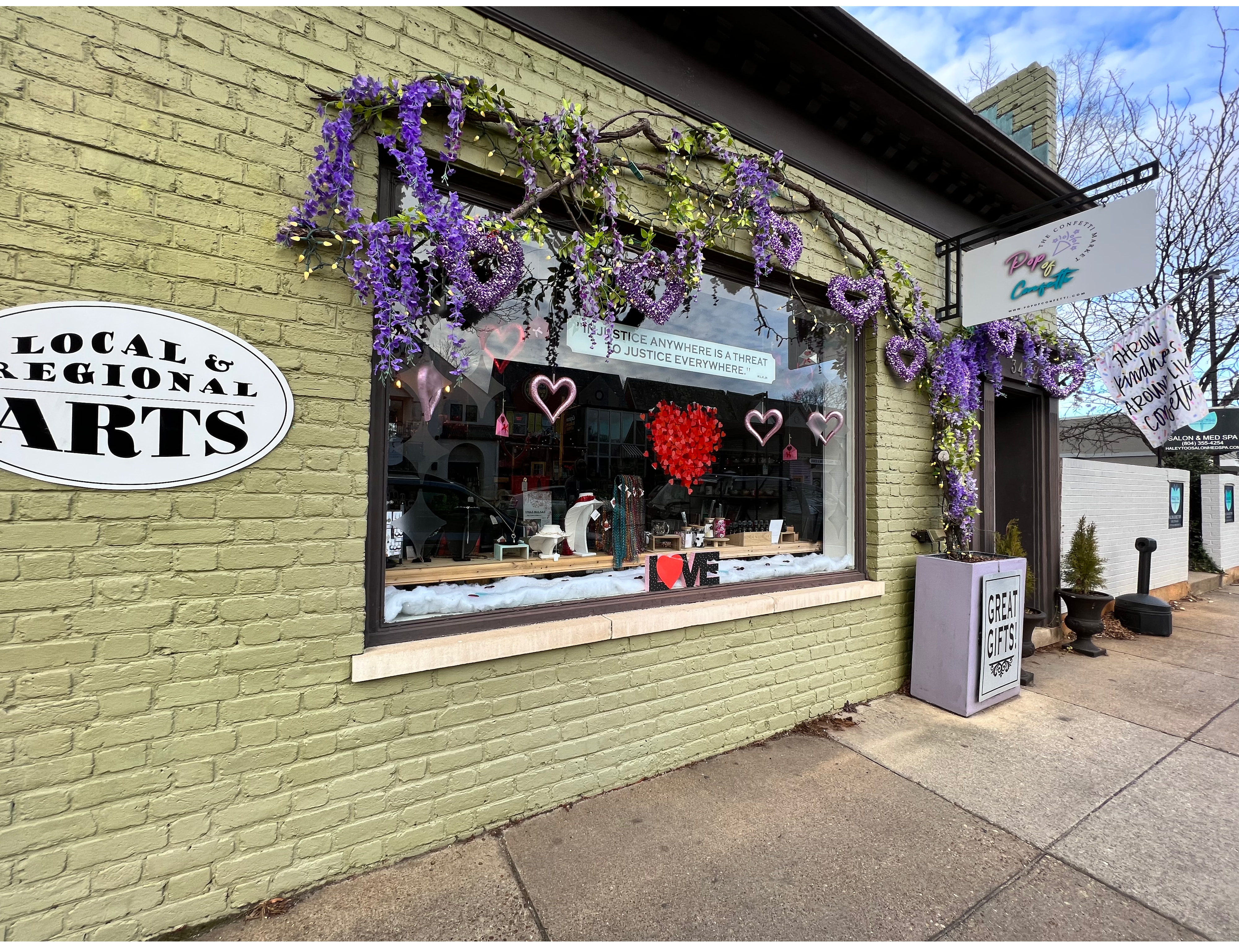 The logo or business face of "Pop of Confetti"