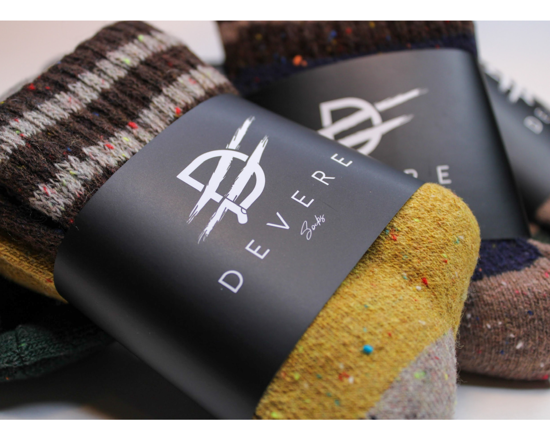 The logo or business face of "Devere Socks"