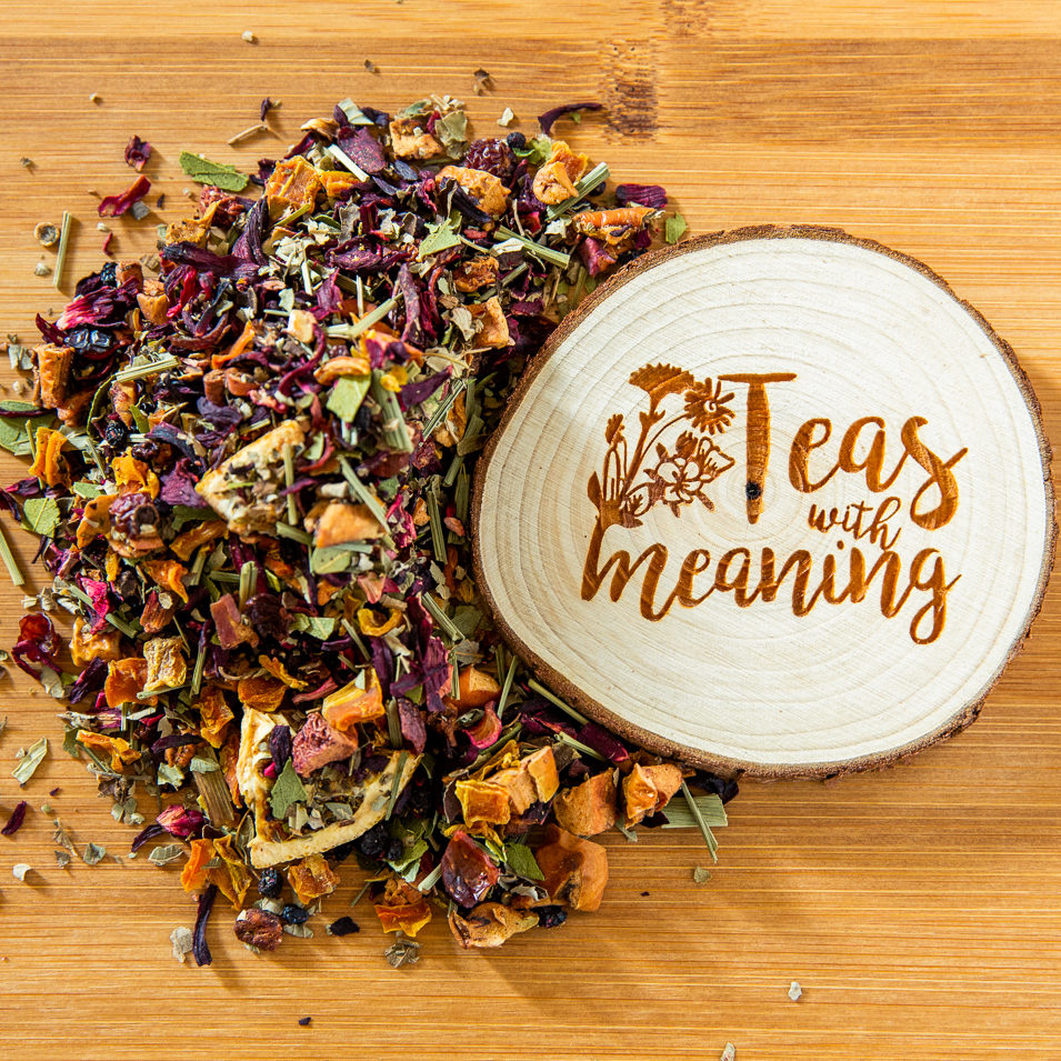 The logo or business face of "Teas With Meaning"