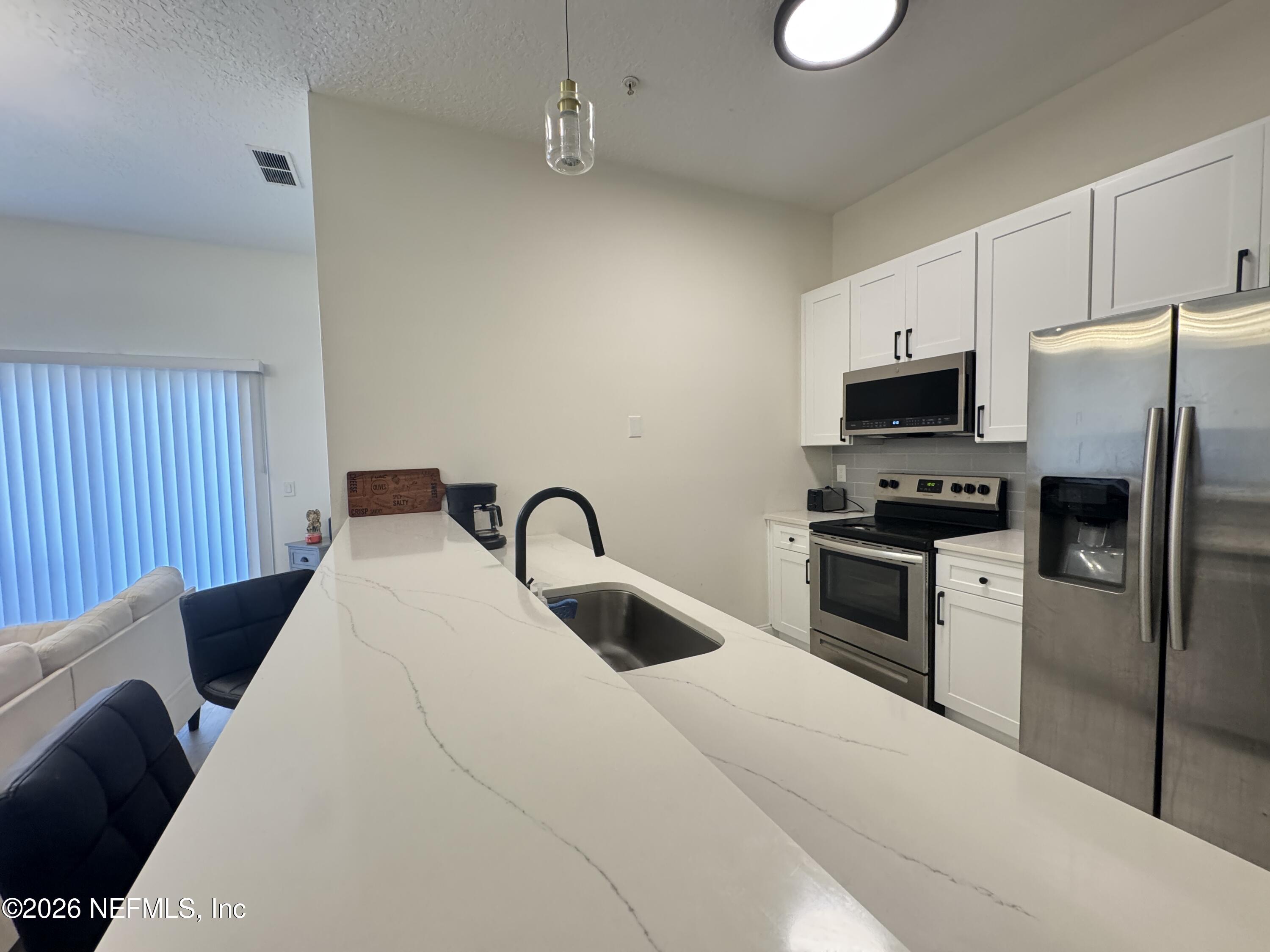 7920 MERRILL Road APT 1205 Jacksonville Florida United States, for Sale, residential, Sultan Ahmed, Realty Hub