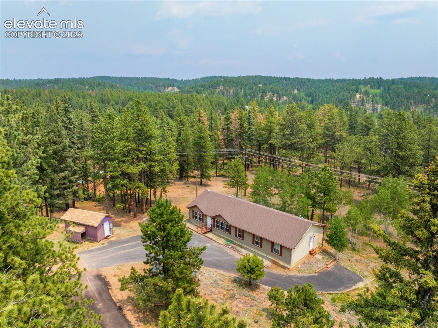 156 Fossil Creek Road Florissant Colorado United States, for Sale, residential, Judy Trout, Blue Spruce Real Estate, LLC