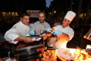 chefs preparing a dish