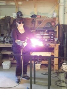 Me welding for the first time at our powercube workshop.