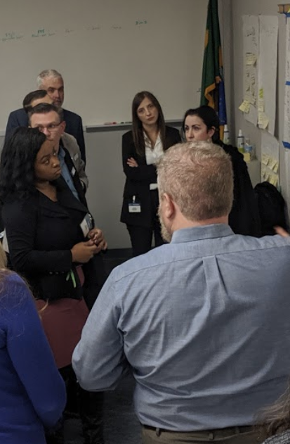 Myself with stakeholders during a workshop