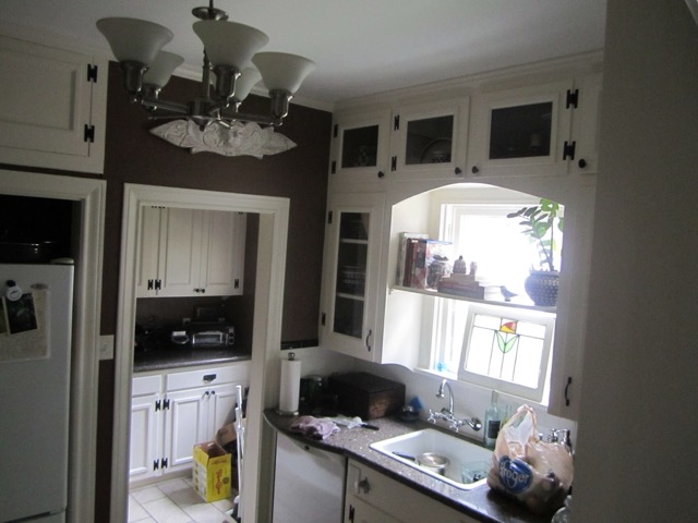 The before photo of the original Woodland Heights kitchen showing cramped flow