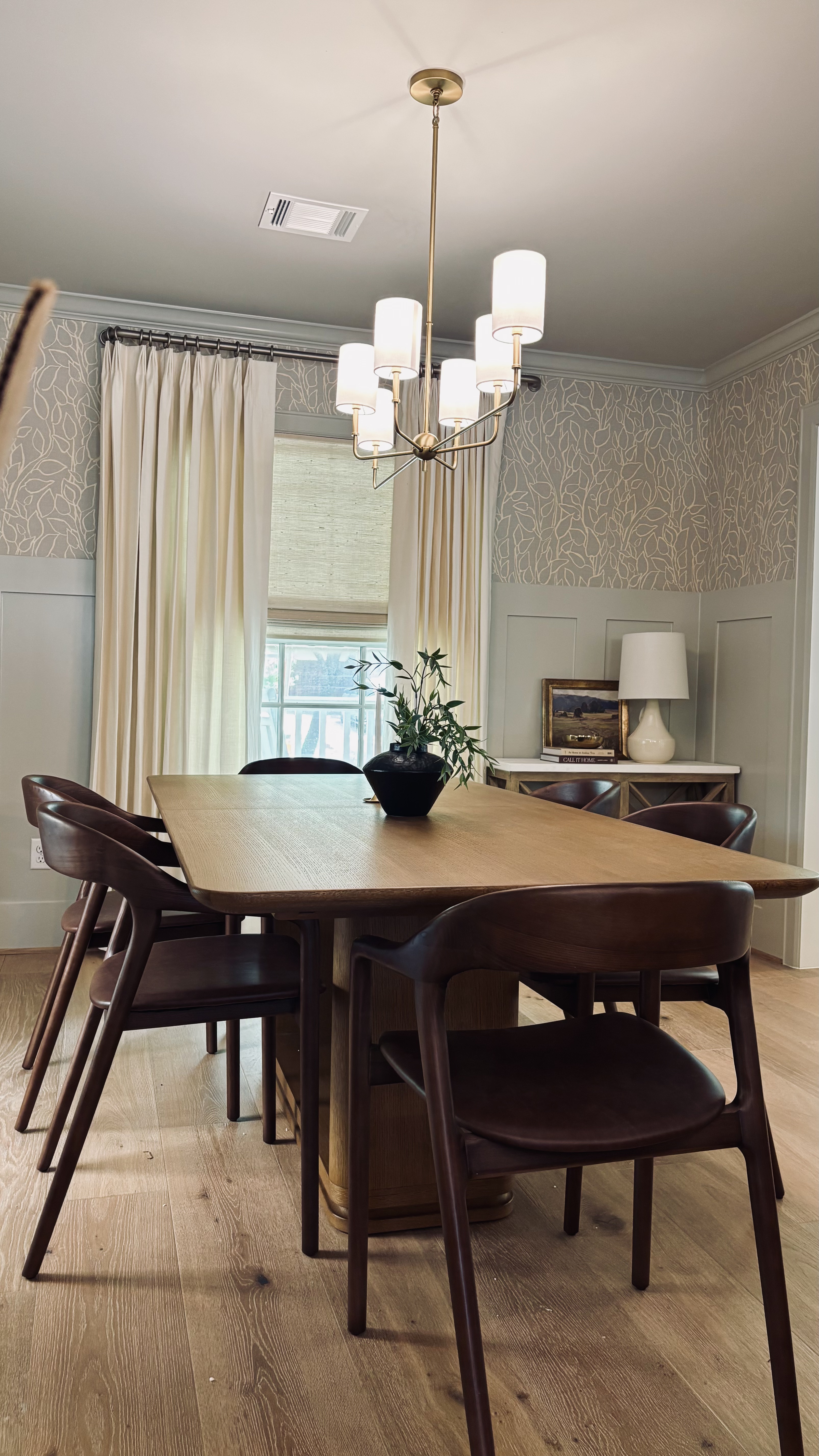 Image of neutral tone remodeled and decorated simple style of dining room