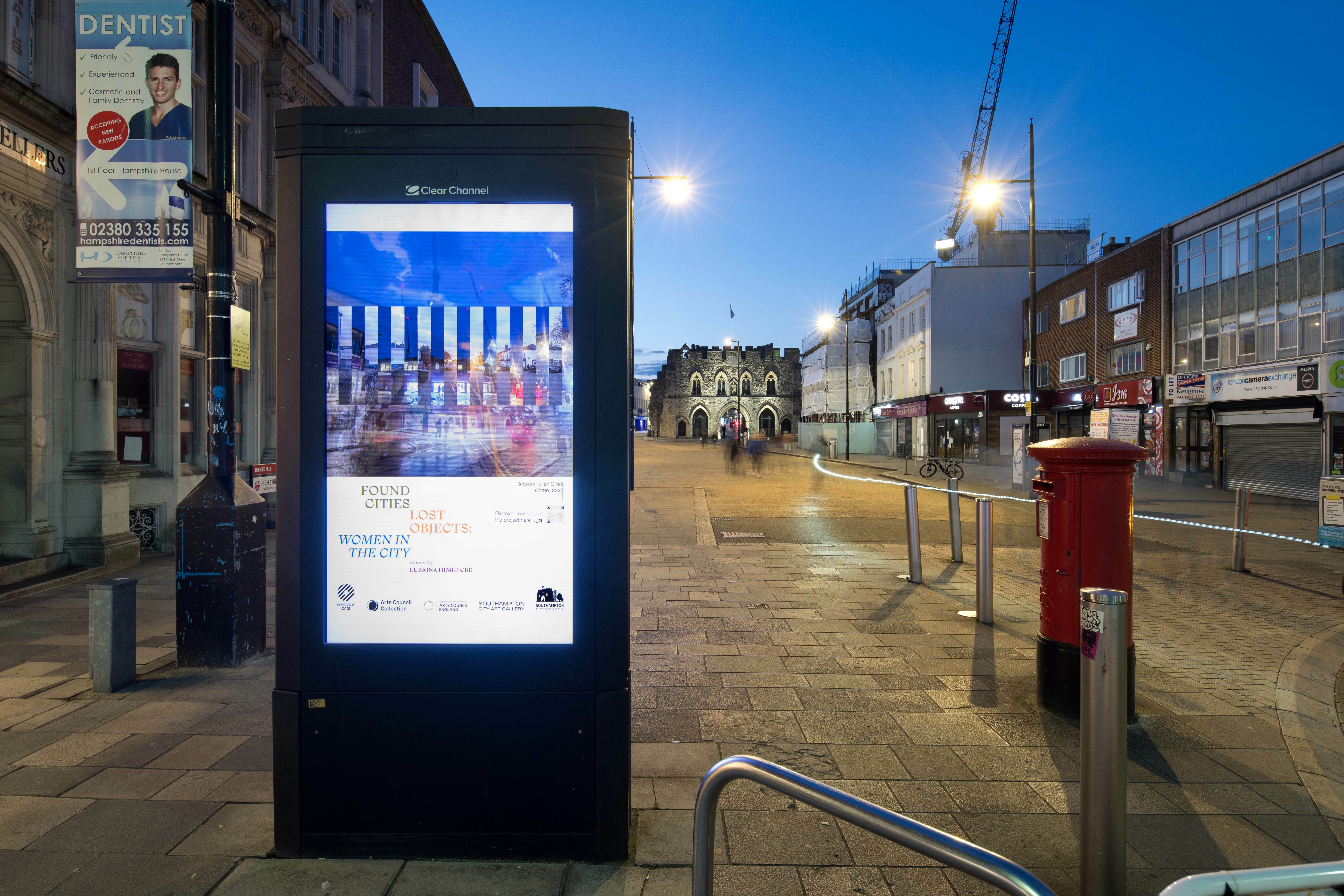 A digital billboard positioned on a pedestrian street